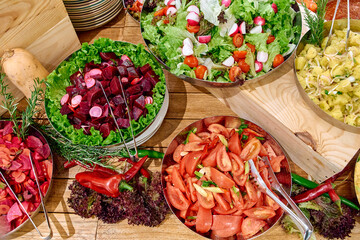 A Colorful Display of Freshly Prepared Salads Featuring Vibrant Vegetables and Greens, Perfect for Nutritious Dining and Healthy Lifestyle Choices