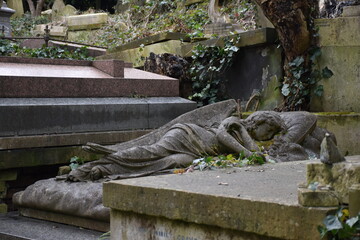 A serene grave sculpture depicting a sleeping figure, enveloped by nature, evoking themes of remembrance, tranquility, and the passage of time in a melancholic setting.