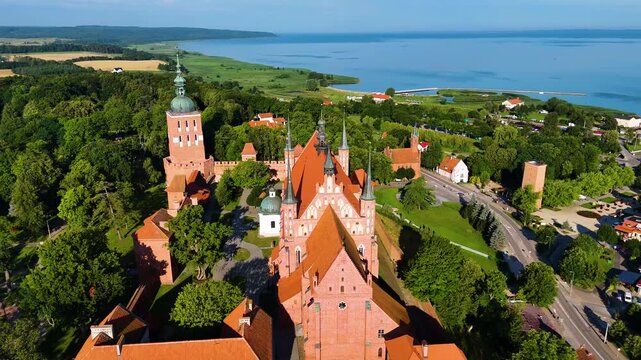 city Old historic catholic church drone flyover Frombork Poland