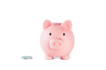Pink piggy bank with coin isolated on white background. Concept of money saving.