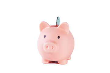 Pink piggy bank with coin isolated on white background. Concept of money saving.