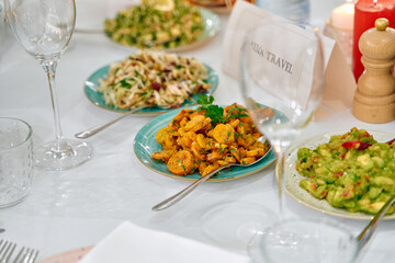 Delicious Asian Cuisine Spread Featuring Fresh Ingredients, Colorful Dishes, and Exquisite Presentation at a Dinner Gathering