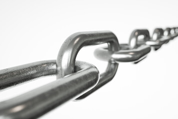 Obraz premium Close-Up of a Metal Chain Laid Horizontally on a White Background – Minimal Industrial Composition with Symbolic Strength and Connection
