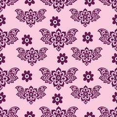 A beautiful repeating pattern design featuring intricate floral motifs in shades of purple on a soft pink background. 