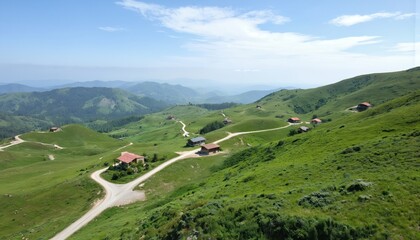 Winding unpaved roads traverse rich green rolling hills under bright blue skies. Scattered houses dot landscape, offering tranquil hideaways. Scenic countryside invites summer travel, adventure,
