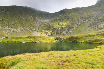 Obraz premium fagaras mountains with Capra lake