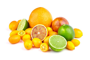 Assorted citrus fruits including oranges, limes, lemons, and kumquats arranged artistically on a...