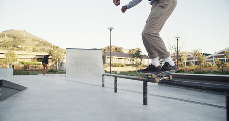 Man, skateboard and stunt in city, railing and fitness with trick, training and extreme sports. Skater, outdoor and person with practice, exercise and urban town with challenge or hobby in Canada