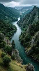 Stunning river winding through steep mountains and lush greenery in a serene landscape at dusk