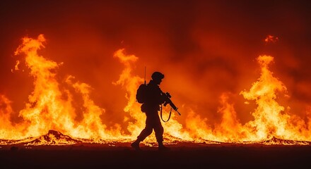 Obraz premium Silhouette of a soldier amidst intense flames.