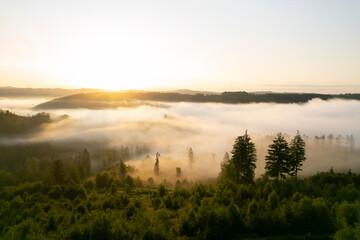 Fog Gently Drifting Through Hills at Sunrise

