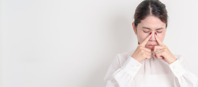 Business Woman having Nose pain for concepts of Nose disease, Common Cold, Influenza, Flu, Covid 19, Respiratory Infection, Sinusitis, Allergic Rhinitis, Asthma, Allergy, Dry nose Anosmia and Health