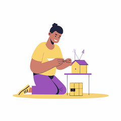 A person building a miniature model of house image. Flat image isolated on white background. Vector illustration.