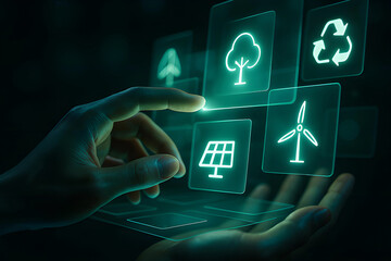 Hand touching glowing green environmental icons on futuristic interface