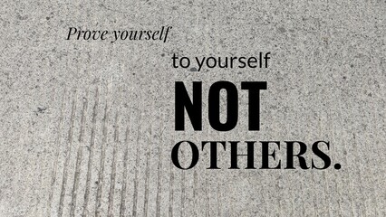 A motivational quote on a textured gray background, stating, Prove yourself to yourself NOT OTHERS.