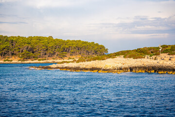 Uninhabited islands of the Lastovo National Park surrounded by calm sea in Croatia. Nature reserve, remote landscape and Mediterranean summer escape