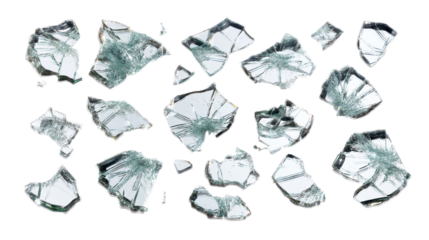 Broken glass pieces scattered on a transparent background
