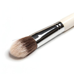 Closeup of a professional makeup brush with soft bristles isolated on white background, perfect for blending