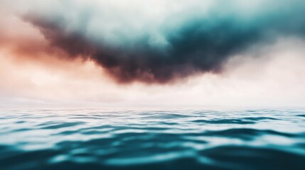 Obraz premium Moody clouds gathering over calm ocean waters at sunset on a serene evening
