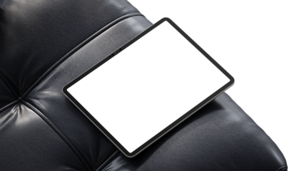 Tablet with blank screen on a leather chair for advertising, promo, and marketing presentation.
