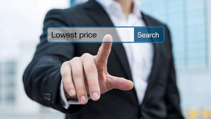 Businessman searches for lowest price on digital interface, aiming for optimal deals