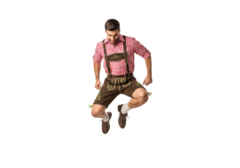 PNG cut out isolated background. An energetic man in traditional Bavarian attire jumps for joy at Oktoberfest.

