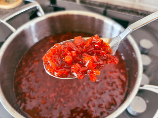 Cooking Sweet and Spicy Red Pepper Jam on the Stove