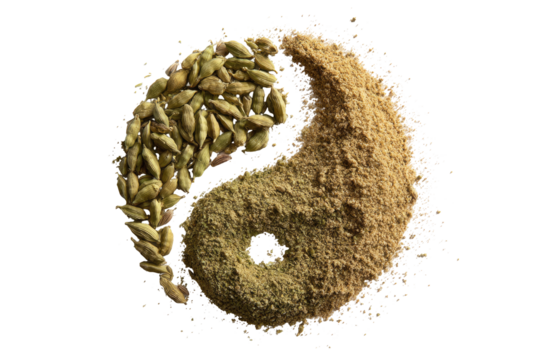 Yin and yang symbol, composed of cardamom seeds and a spice powder