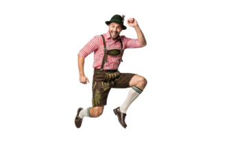PNG cut out isolated background. A full-length portrait of a happy and energetic man in traditional Bavarian lederhosen, captured mid-air as he jumps for joy to celebrate a German festival Oktoberfest