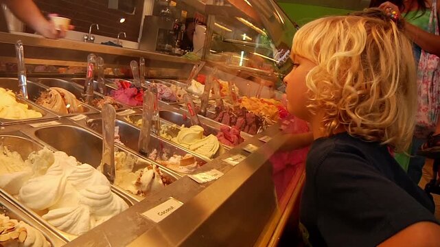 Kids Looking at Fresh Gelato Display in Ice Cream Shop