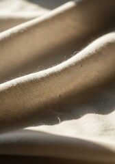 Abstract textured fabric surface evokes a sense of calm and understated elegance for design