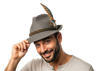 PNG cut out isolated background. A close-up portrait of a handsome and happy mature man with a grey beard, smiling while tipping his traditional green Bavarian hat in a friendly greeting.