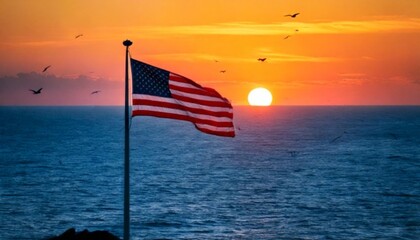 American Flag Waving Over Ocean at Sunset"