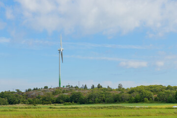 Electricity generation through wind power using wind turbines, an eco-friendly renewable energy source that produces no greenhouse gas emissions or air pollutants, Alands, Finland