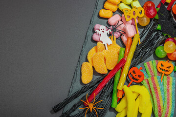 Traditional festive composition for Halloween party. Sweet seasonal food, homemade autumn decor