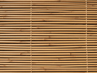 Obraz premium Woven bamboo surface texture creates a tropical atmosphere perfect for natural and warm interior decoration.