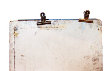 Vintage sketch board with two old metal clips at the top, showing rust, stains, and age marks on a discolored surface. isolated on white background.