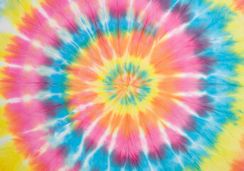 Obraz premium Vibrant Pastel Tie-Dye Swirl: Psychedelic Rainbow Spiral Texture Background for Fashion, Design, and Textile Projects.
