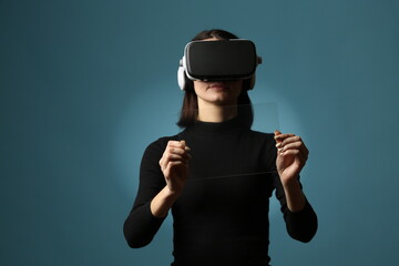 Woman Using Virtual Reality Headset and Touching Futuristic Transparent Dashboard Interface