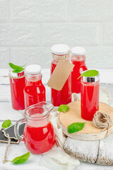 Homemade watermelon kombucha. Healthy probiotic drink, kvass with basil leaves. Fermented beverage