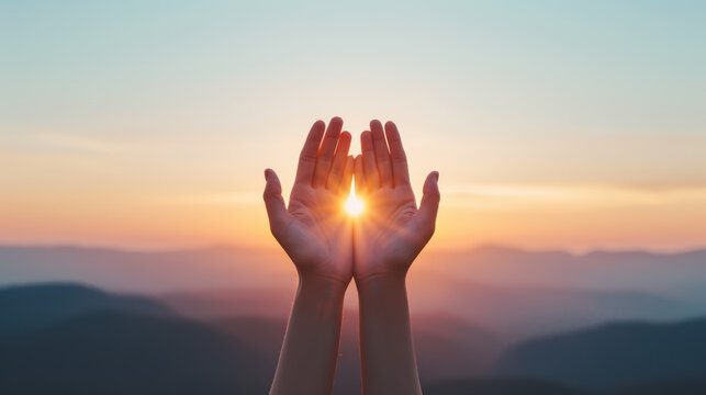 A person's hands are open to the sun, symbolizing peace and hope