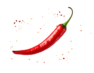 Chili powder and chili flakes burst out from red chili pepper on black