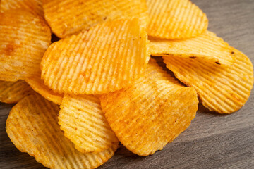 Potato chips , delicious BBQ seasoning spicy for crips, thin slice deep fried snack fast food.