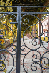 Yellowing vine alley in Sveti Stefan, Montenegro — autumn season