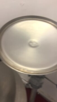 Craft Beer Production. The Moment the Wort is Boiling. Video Footage from the Computer Screen to the Tank. Milano, Italy