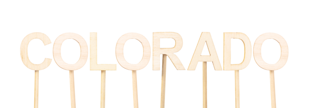Design with vertical wooden letters forming the word Colorado, ideal for creative resources about US states, educational activities, and patriotic crafts