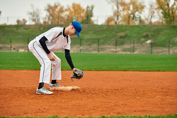 Teenage boy showcases skills on vibrant baseball field during afternoon practice