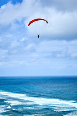paraglider over the sea
