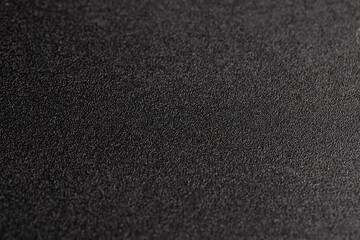 Fototapeta premium plastic surface, details of a part of an object made of black plastic, close up