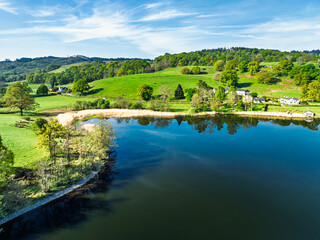 Fototapeta premium Farms over Esthwaite Water from drone, Lake District National Park, Cumbria, UK